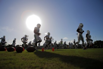 Miami Dolphins players warm up during training camp in Davie on Aug. 5, 2016. Randy Vazquez, Sun Sentinel