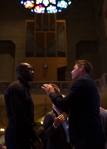 Former NFL players Steve Young, right, and Terrell Owens, left, talk after a private memorial service for San Francisco 49ers great Dwight Clark at Grace Cathedral in San Francisco on Wednesday, Aug. 1, 2018. (Randy Vazquez/ Bay Area News Group)