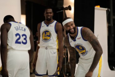 DeMarcus Cousins, right, smiles while talking to teammates, Kevin Durant, center, and Draymond Green, left, during Golden State Warriors Media Day in Oakland, Calif., on Monday, Sep. 24, 2018. (Randy Vazquez/Bay Area News Group)