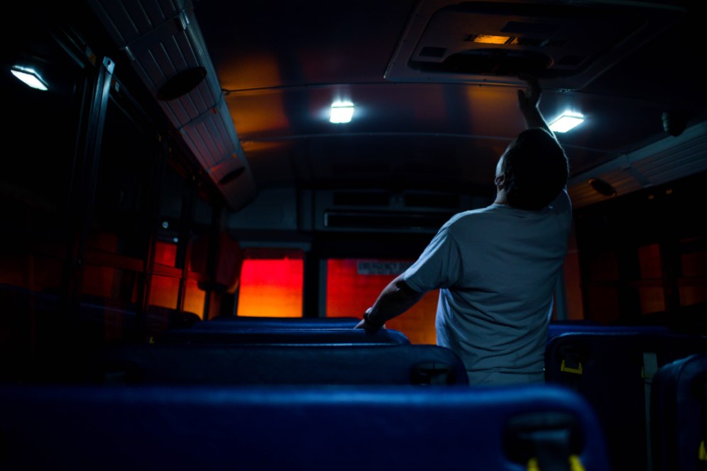 Bus driver Tim McGinnis, inspects his bus before starting his route at the San Jose Unified School District bus yard in San Jose, Calif., on Thursday, Feb. 28, 2019. (Randy Vazquez/Bay Area News Group)