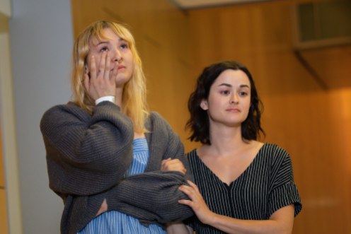 Brynn Ota-Mathews, left, and Gabriella Gaus, right, hold each other during a press conference at Santa Clara Valley Medical Center in San Jose, Calif., on Thursday, Aug. 1, 2019. Both Ota-Mathews and Gaus suffered gunshot wounds at the Gilroy Garlic Festival. (Randy Vazquez/Bay Area News Group)